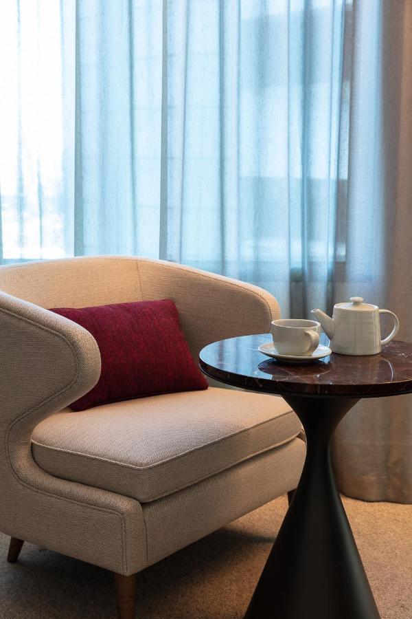 Next Hotel Melbourne, Curio Collection By Hilton Экстерьер фото A tea set